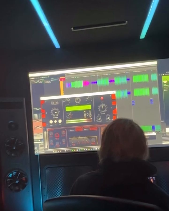Zak at the mix position at Hacienda, session on the big screen