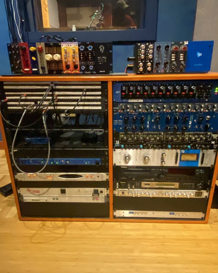 A tall rack of outboard preamps and compressors